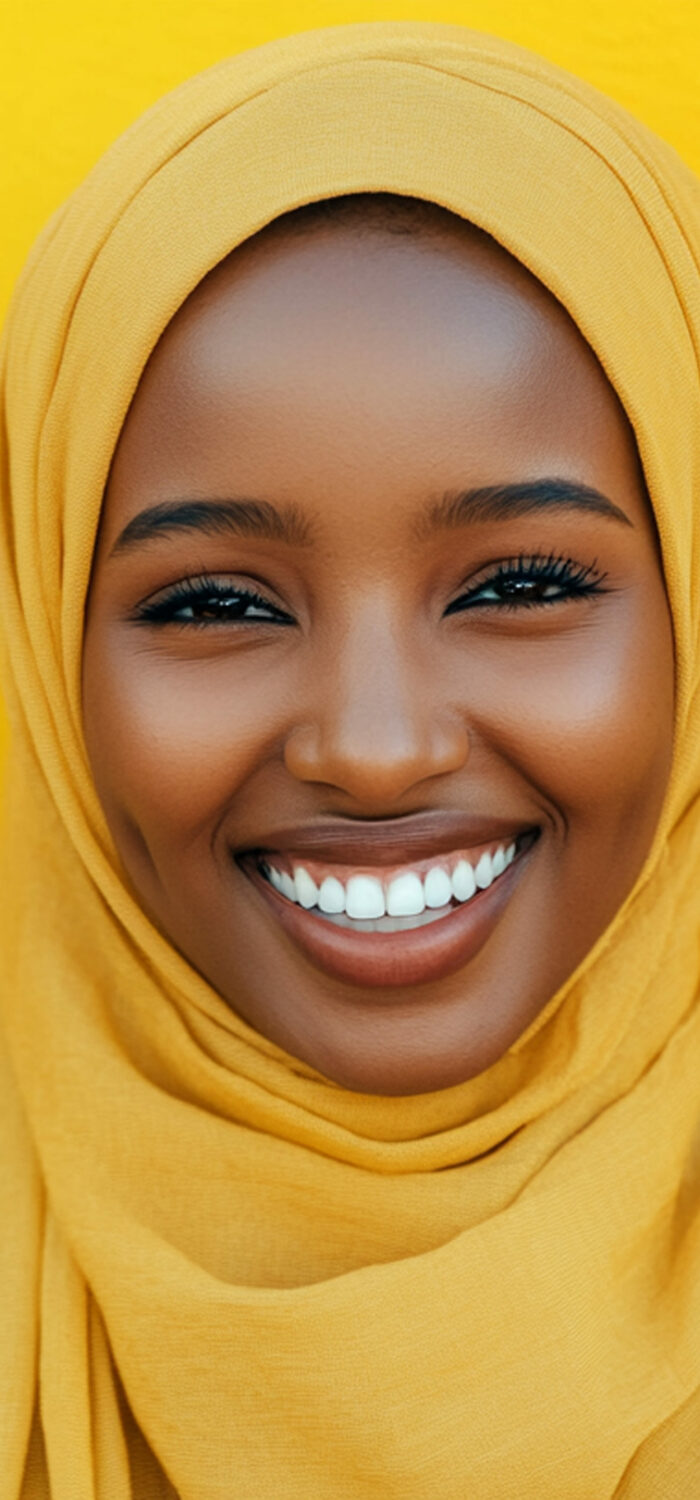 Portrait of a Sincerely Laughing Black Muslim Creating a Positive Atmosphere in Social and Cultural Settings